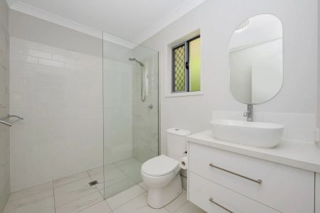 Spacious 4-Bedroom Home with Modern Comforts - Photo 2