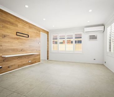 Freshly Renovated Home with Modern Style & Spacious Yard - Photo 5