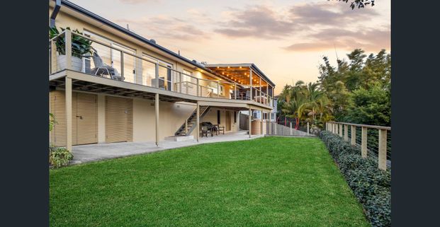 Stunning Family Home opposite Bungan Beach - 2 month lease available - Photo 1