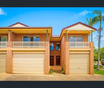 Freshly Updated Three-Bedroom Townhouse with Double Garage - Photo 5