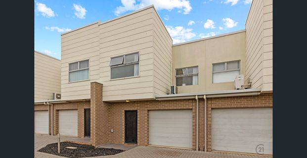 Modern 3-Bedroom Townhouse in a Quiet, Convenient Location - Photo 1