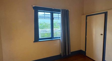 Comfortable 4-Bedroom Home in a Handy Location - Photo 2