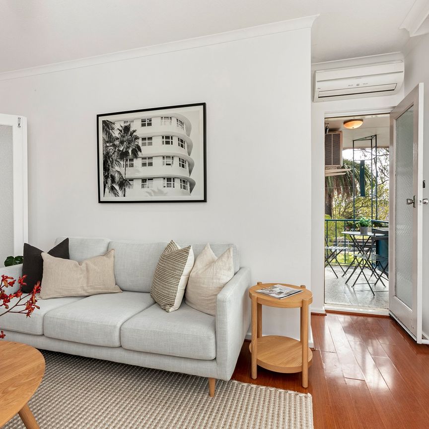 Comfortable, Spacious and Well Located! - Photo 1