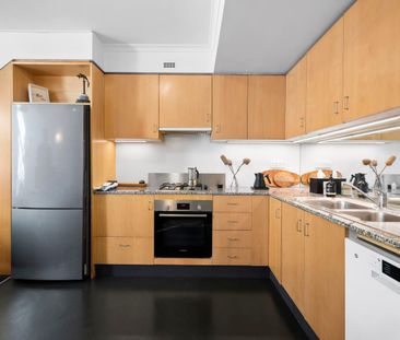 Bright & Spacious Split-Level Apartment Filled with Natural Light - Photo 6