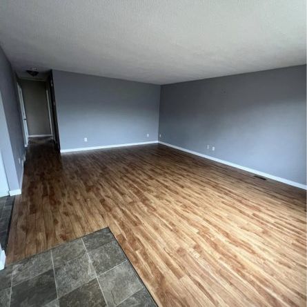 Spacious 2 bed 1 bath main floor suite - Photo 1