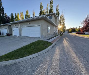 Updated 3-Bed Townhome with Double Garage + Driveway in Cedarbrae —... - Photo 1