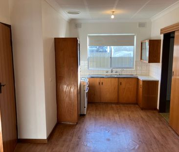 Two bedroom unit with secure garage and air conditioning - Photo 3