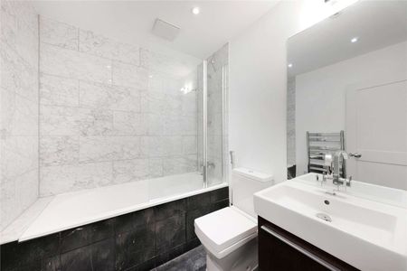 A first floor one bedroom apartment in a recently refurbished building benefitting from a generous reception room with 3.5m high ceilings, lift access and wooden flooring throughout. - Photo 3