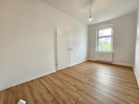 Diese schöne renovierte Wohnung wartet auf Sie mit Einbauküche - Foto 5