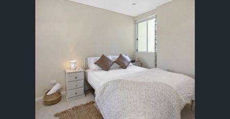 Sun-Drenched Dual-Level Living with Resort-Style Facilities - Photo 3