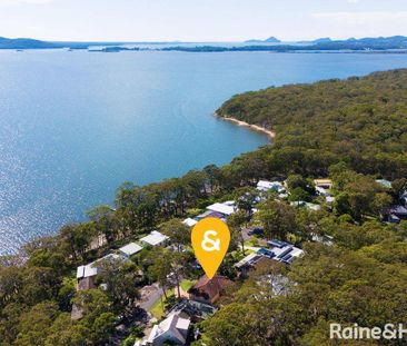 Family Haven with Waterfront Views - Photo 3