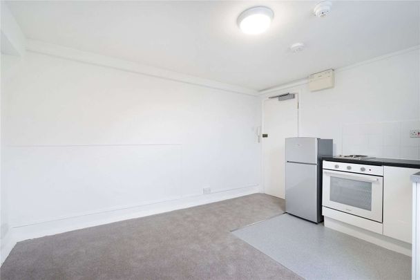 A fourth floor studio apartment situated on Cranley Place, a quiet residential street in South Kensington - Photo 1