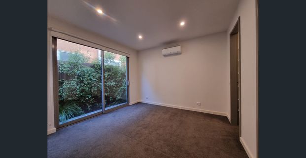 Modern Townhouse In McKinnon School Zone - Photo 1
