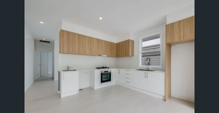 Modern One Bedroom Home with Additional Living Space! - Photo 3