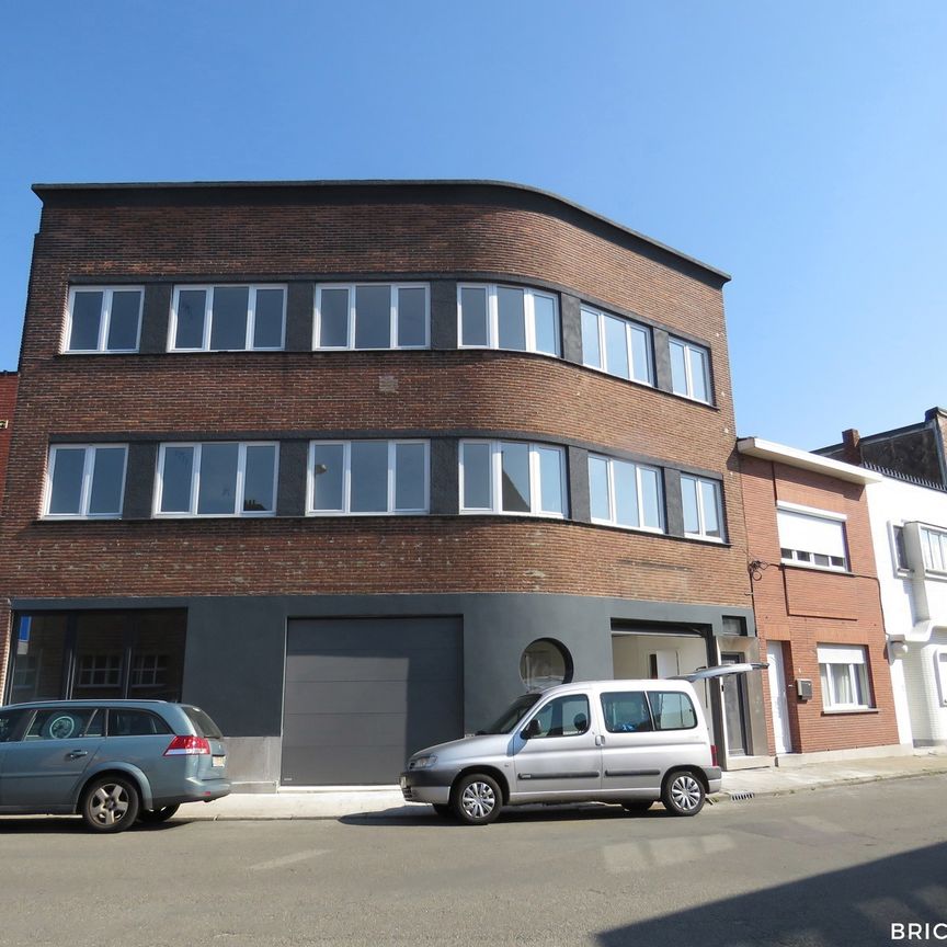 Gelijkvloers appartement met tuin en garage - Photo 1