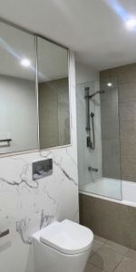 Elevated Ground Floor Gem in Convenient Location - Photo 3