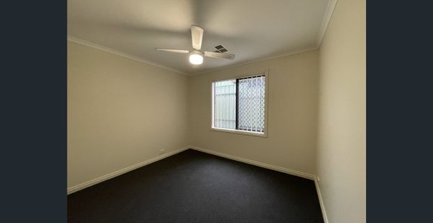 4 Bedroom Home with Ample Living Space - Photo 1