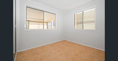 Home with Large Shed & Multiple Living Areas - Photo 5