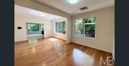 BRIGHT FAMILY RETREAT WITH MULTIPLE LIVING SPACES & GARDEN VIEWS - Photo 3