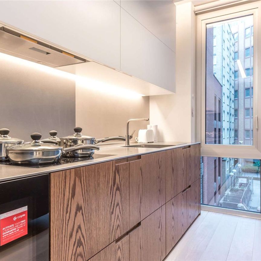 An exceptional 1 bedroom apartment located on the second floor of this development in a prime position on the historic Bartholomew Close, EC1A. - Photo 1