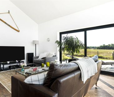 A recently built contemporary barn style property occupying a fabulous semi-rural position on the edge of this superbly placed village. - Photo 2