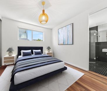 DEPOSIT TAKEN - Oversized Designer 2-Bedroom Apartment Bathed in Na... - Photo 3