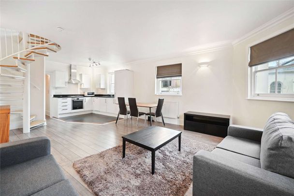 A spacious 3 bedroom duplex apartment, arranged over the upper 2 floors in this central location - Photo 1