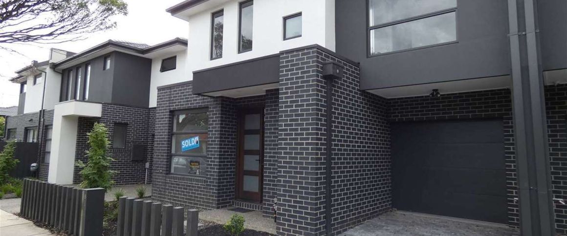 Modern Townhouse in Heart of Carnegie - Photo 1