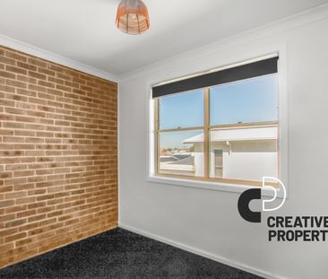 Split level 3-bedroom townhouse moments from the beach! - Photo 1