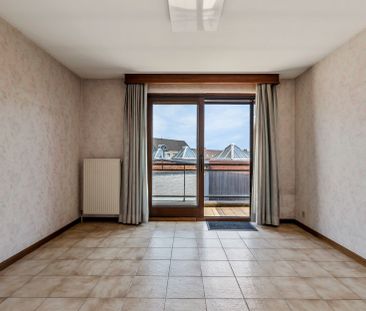 Lichtrijk appartement met 2 slaapkamers, terras en garagebox - Photo 2