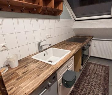 Gemütliche Dachgeschosswohnung - Foto 1