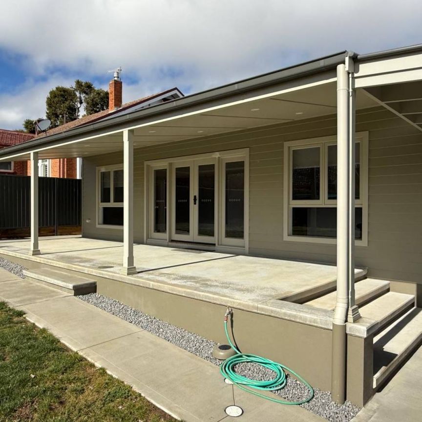 BEAUTIFULLY RENOVATED - 4 BEDROOMS - Photo 1