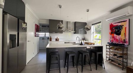 Stylish Family Living with Resort-Style Garden - 4Brm in Millwater - Photo 2