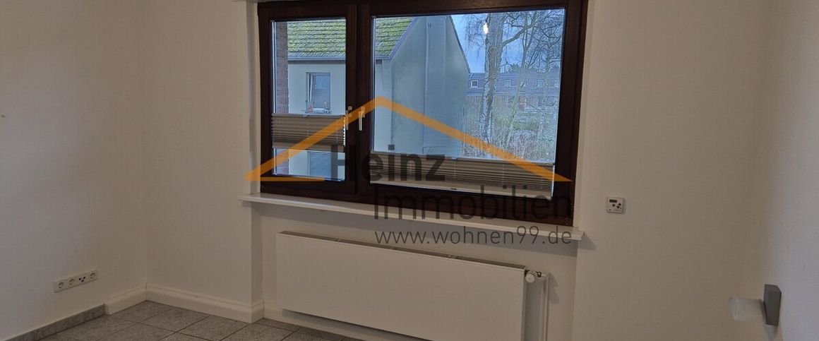 Gemütliche Maisonettewohnung in toller Lage von Dünnwald - Foto 1