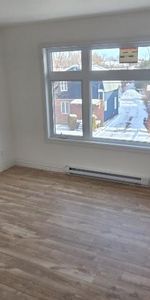 5 1/2 a louer, construction 2025, jamais habité, triplex tranquille proche du centre ville. - Photo 4