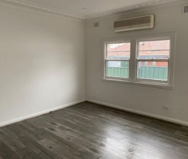 SPACIOUS THREE BEDROOM HOME IN A SOUGHT AFTER LOCATION - Photo 1