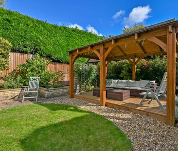 A beautifully refurbished three-bedroom detached home in the sought... - Photo 6