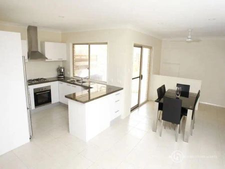 “Spacious & Stylish Family Home in Springfield Lakes” - Photo 4