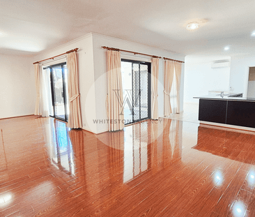 Spacious Double-Storey Home | Central Location - Photo 2