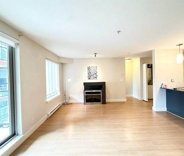 beautiful corner unit offers 2 bedrooms - Photo 1