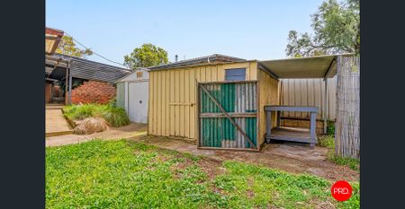 Charming Family Home with Spacious Living and Unique Character - Photo 5