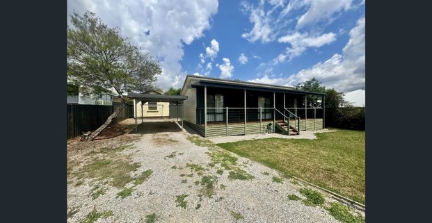 Modern 2-Bedroom Austam-Style Home - Photo 1