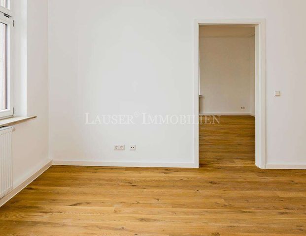 Attraktive Drei-Zimmer-Altbauwohnung mit Balkon in kernsaniertem Haus - Foto 1