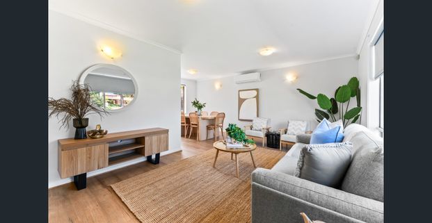 Modern Coastal Living in a Prime Location - Photo 1