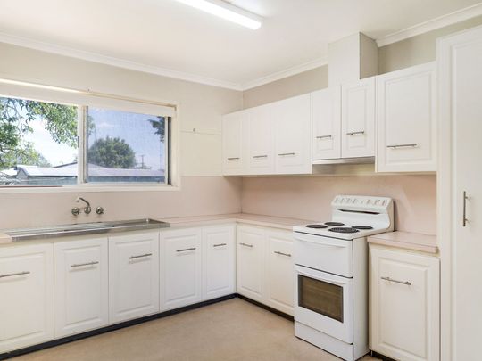 Spacious Family Living in Sought-After East Toowoomba - Photo 1