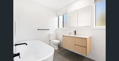 Modern Two-Bedroom Home in a Quiet, Ultra-Convenient Location - Photo 5