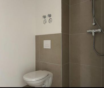 Neubau Erstbezug: helle 1,5- Zimmer Wohnung mit Balkon und Küche - Photo 1