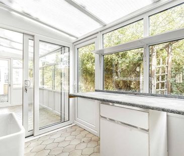 A three bedroom detached bungalow situated within the Village of Bu... - Photo 2