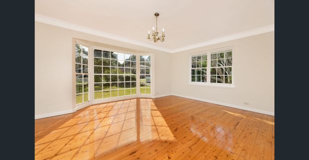 Family home with multiple living areas - Photo 1