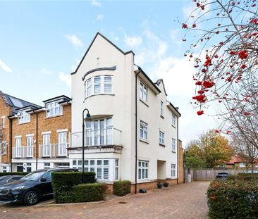 A contemporary four bedroom townhouse with a driveway. - Photo 5